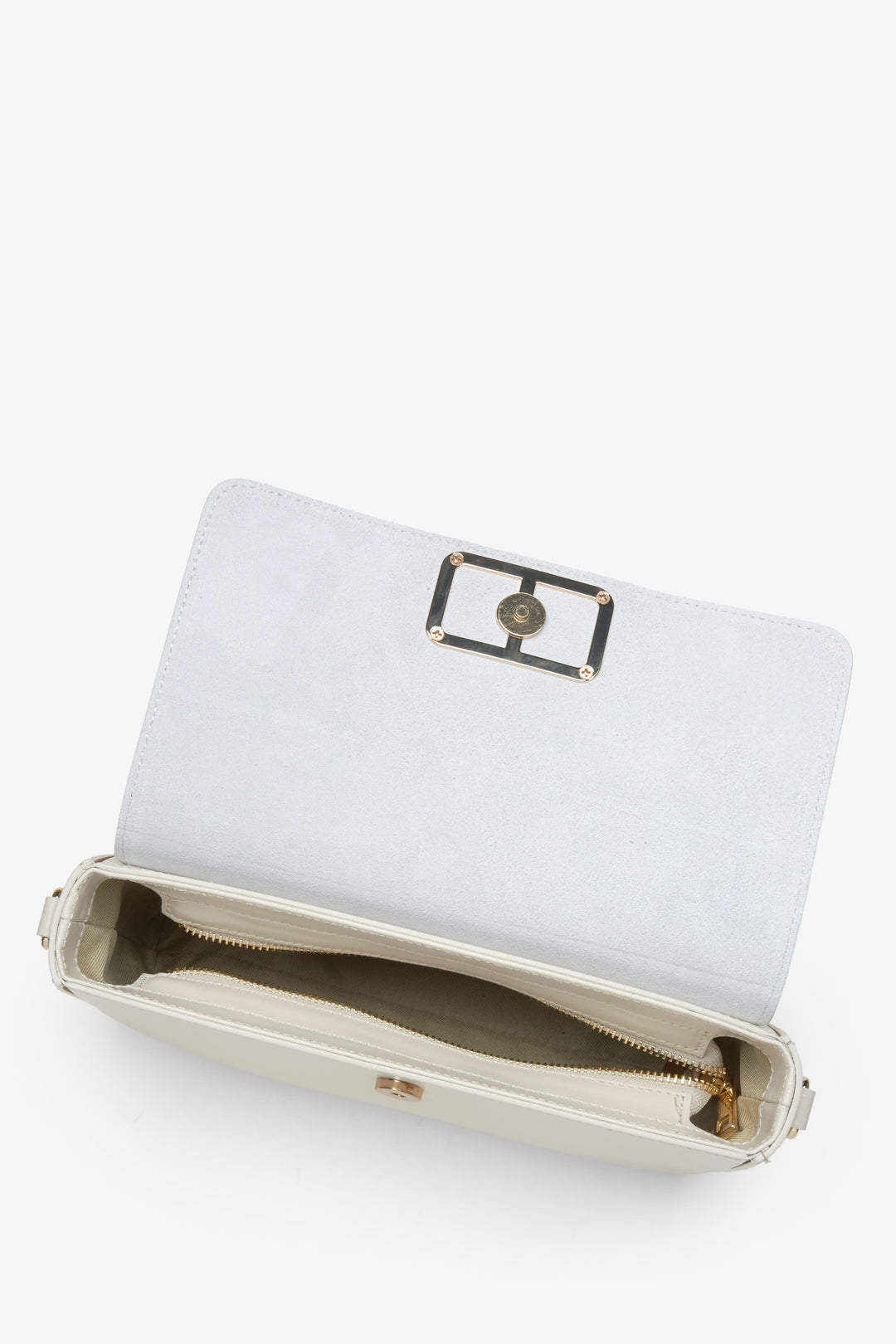 Small women's handbag in milky-beige, designed in the baguette style.