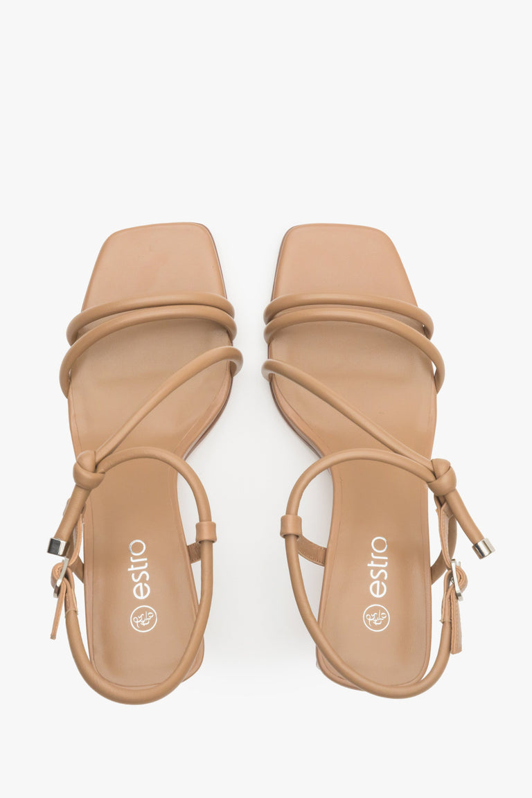 Women's strappy sandals in light brown on a block heel - presentation of the footwear from above.