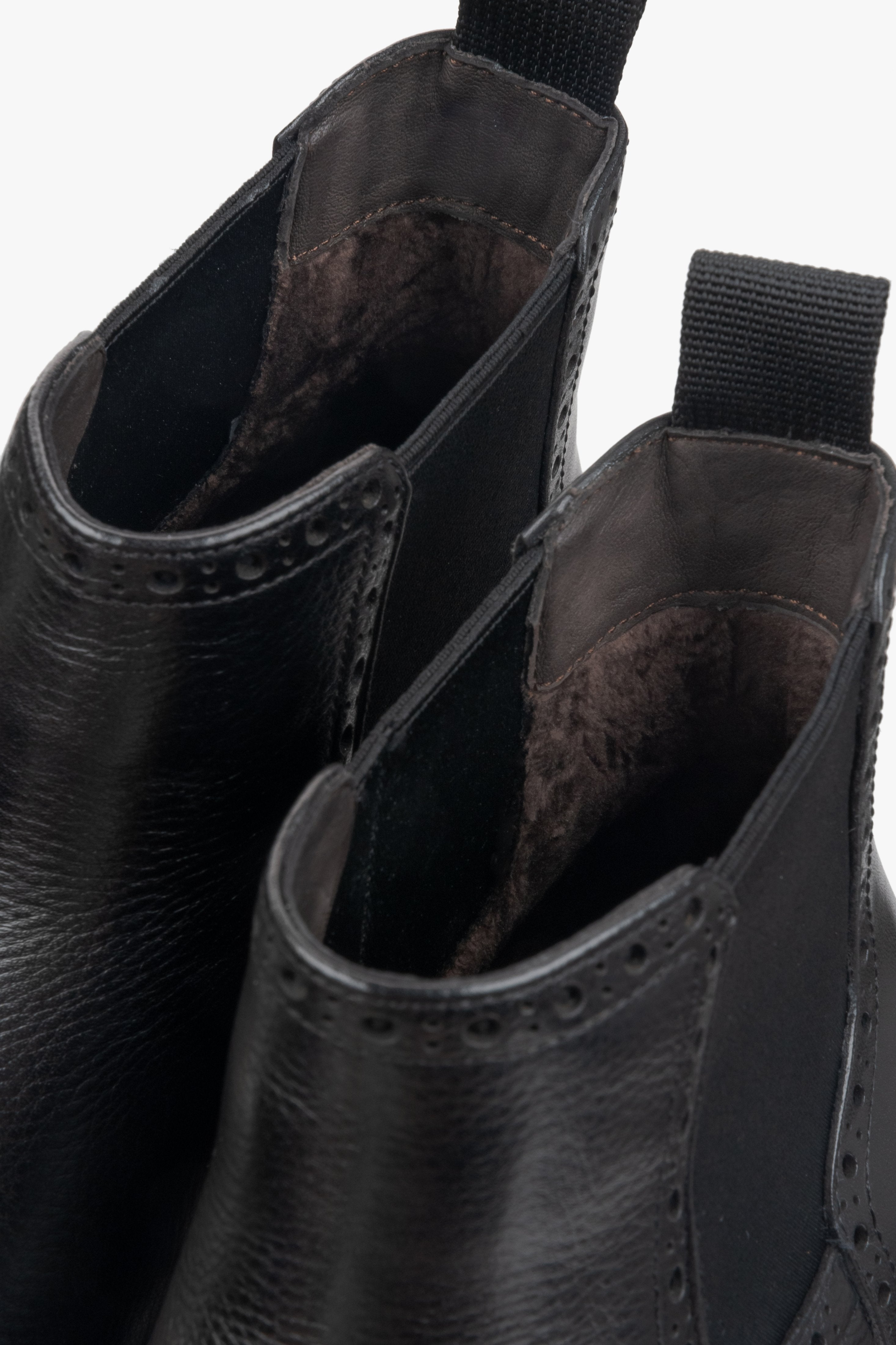 Men's leather Chelsea boots Estro black with folk-style perforation - close-up of the upper shaft.