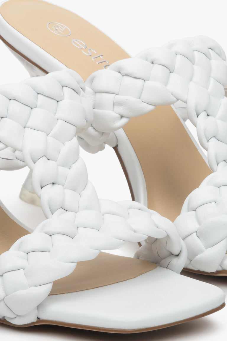 Women's white leather heeled sandals - a close-up on details.