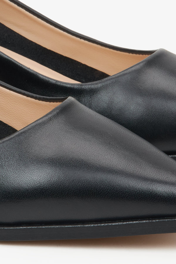 Women's leather black pumps by Estro - close-up on the details.