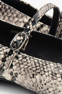 Black and white leather Estro women's ballet flats with animal print – the essence of original style and everyday comfort.