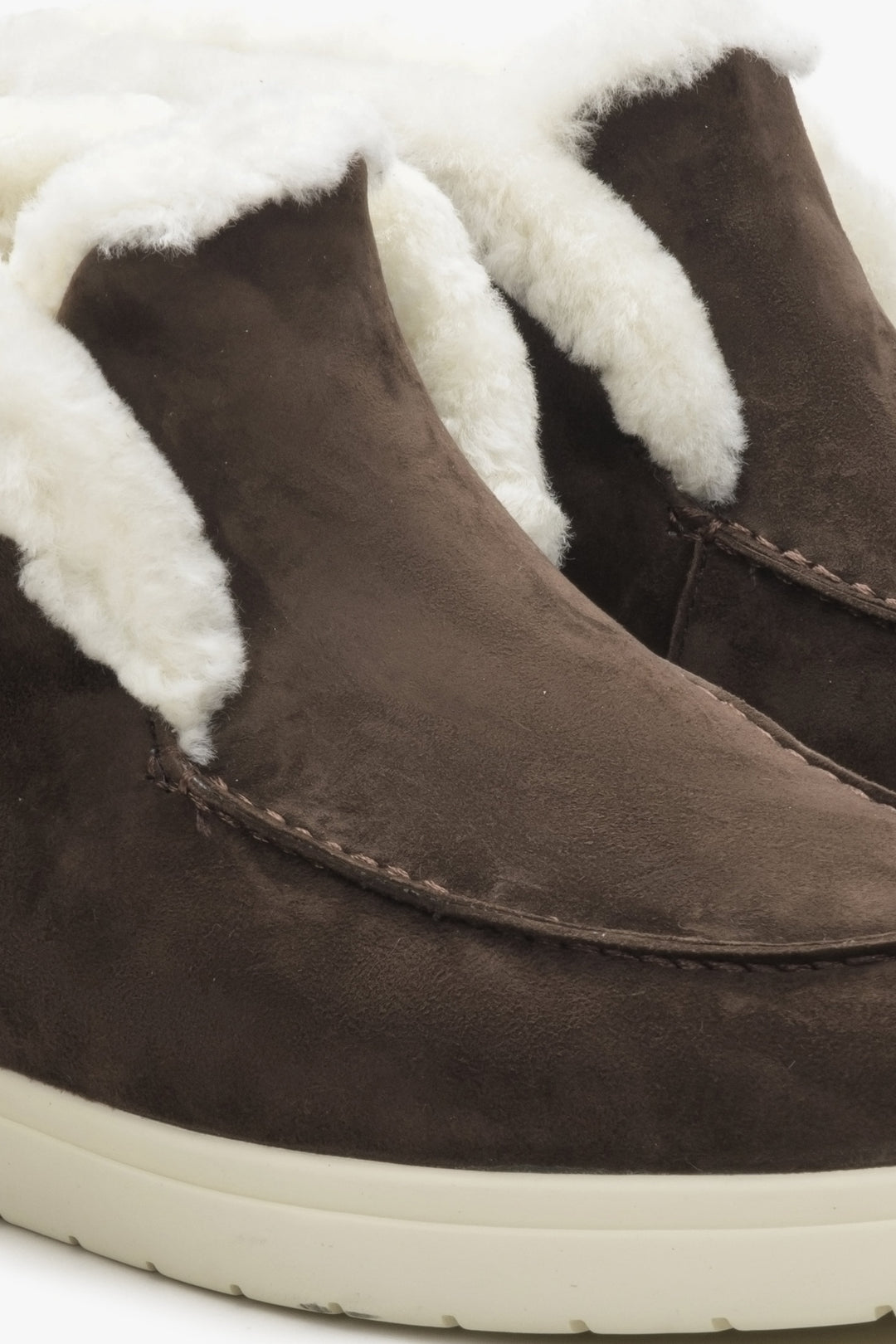 Women's fur and velour ankle boots in saddle brown colour.