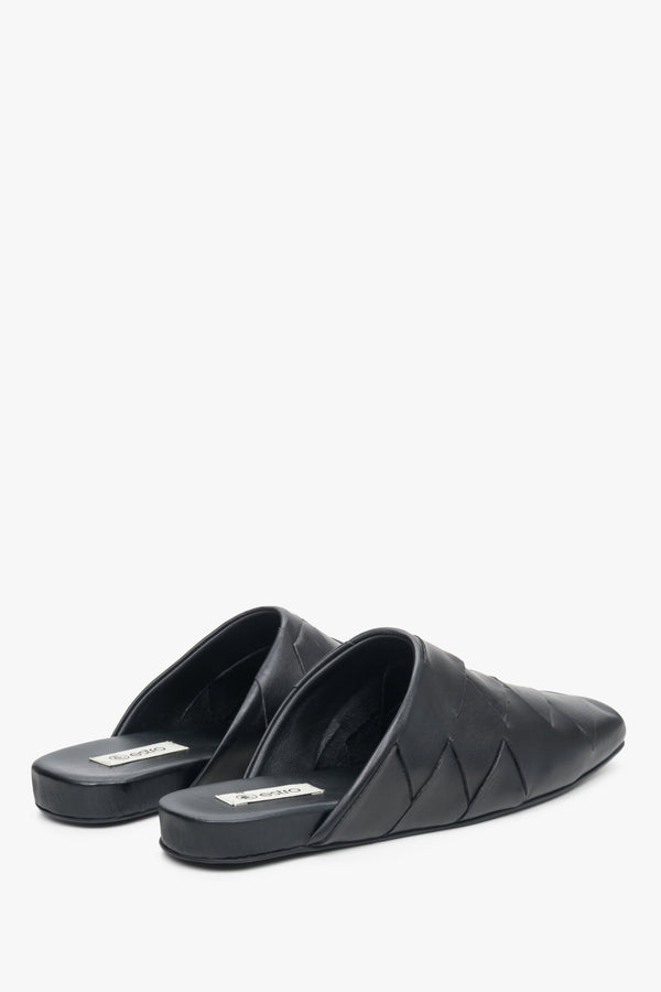 Women's black leather slides by Estro.