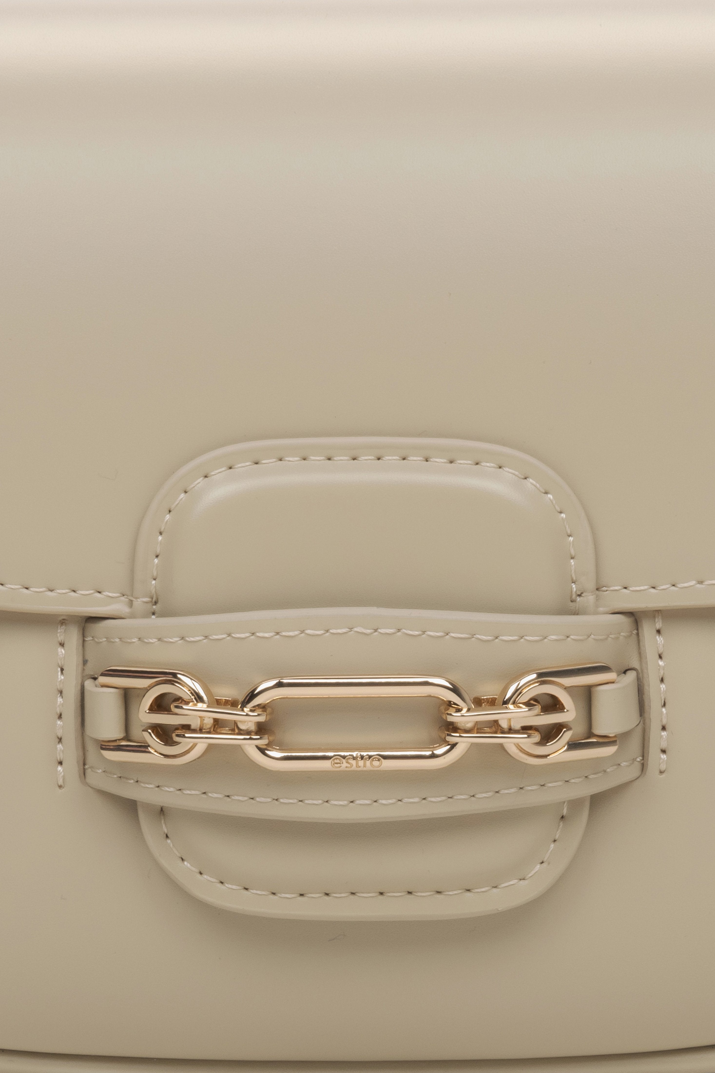 Women's beige leather bag - close-up on the detail.