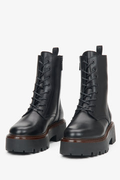 Women's black leather ankle boots by Estro - close-up of the front of the model.