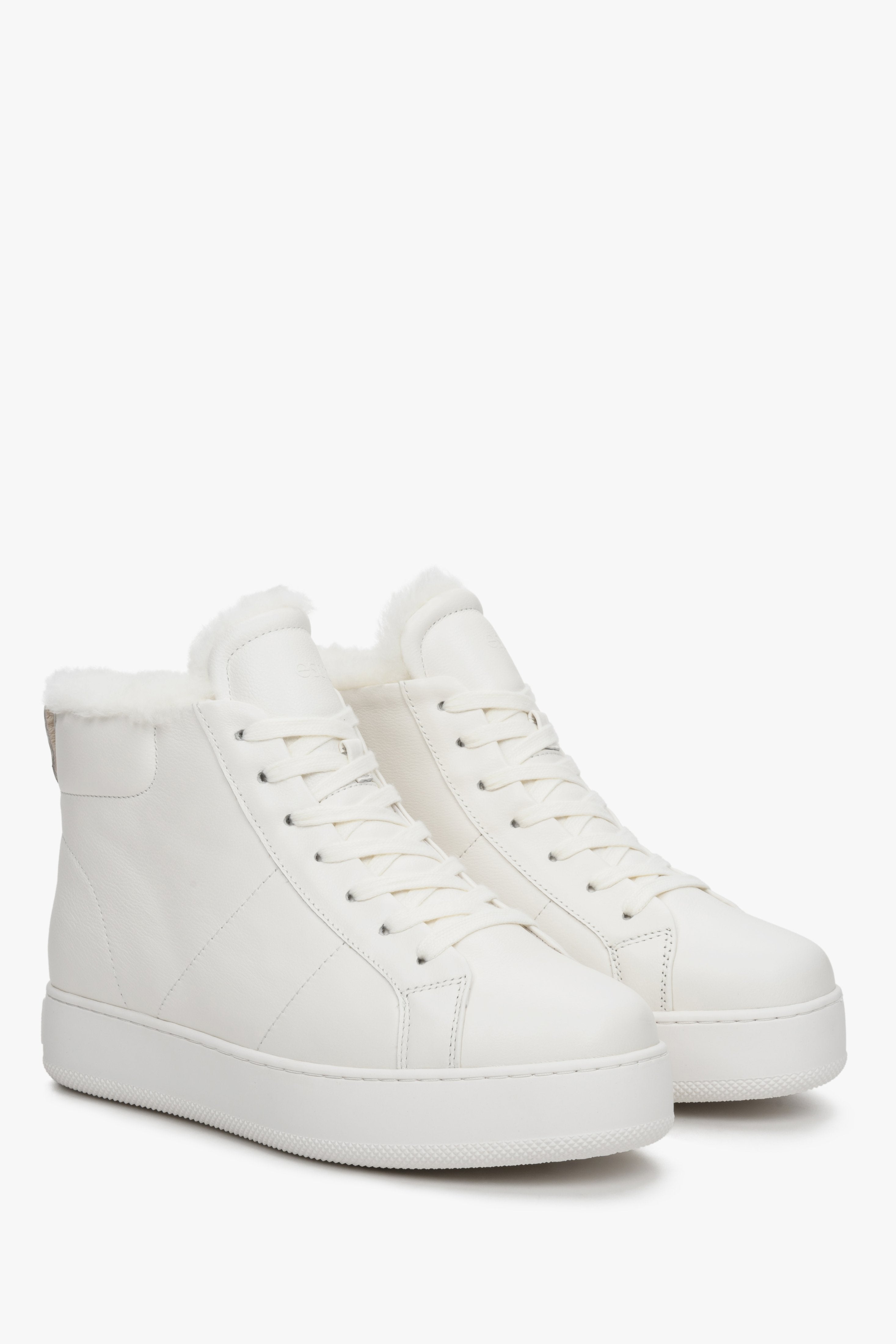 High-top women's white winter sneakers by Estro with winter insulation.