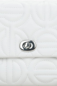 Women's small white  shoulder bag with a silver chain - details.
