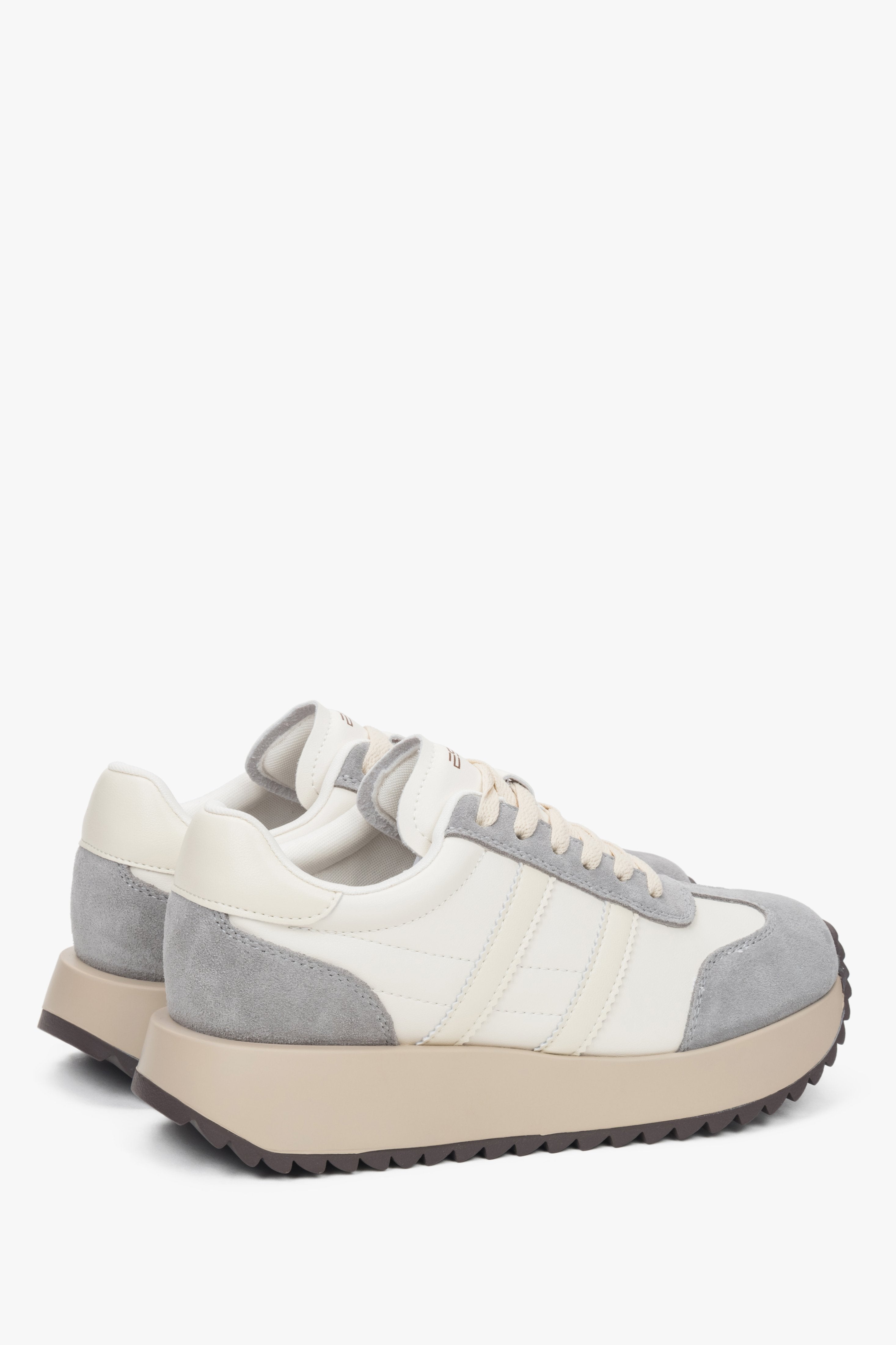 Side profile of the women's ES8 low-top sneakers, showing the beige and grey velour and leather upper.