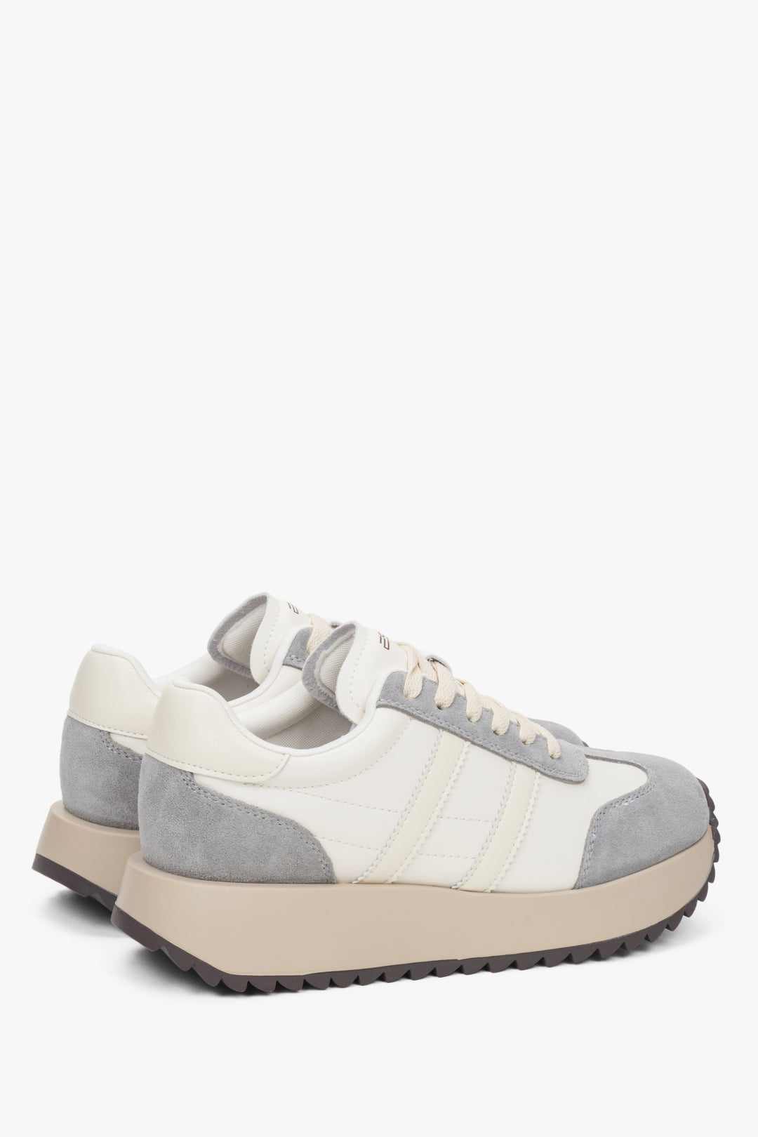 Side profile of the women's ES8 low-top sneakers, showing the beige and grey velour and leather upper.