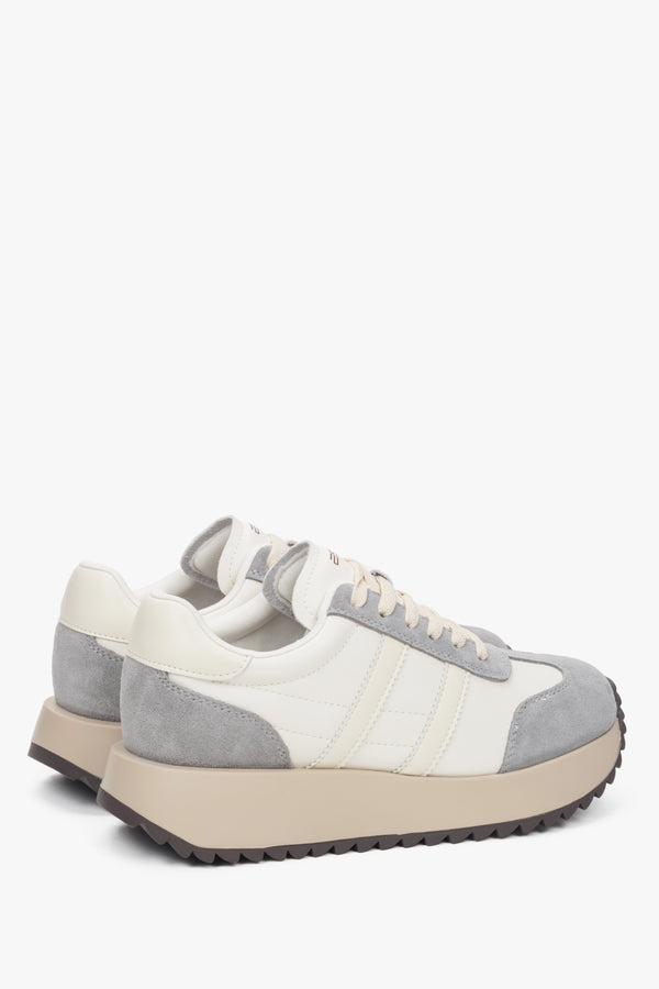 Side profile of the women's ES8 low-top sneakers, showing the beige and grey velour and leather upper.