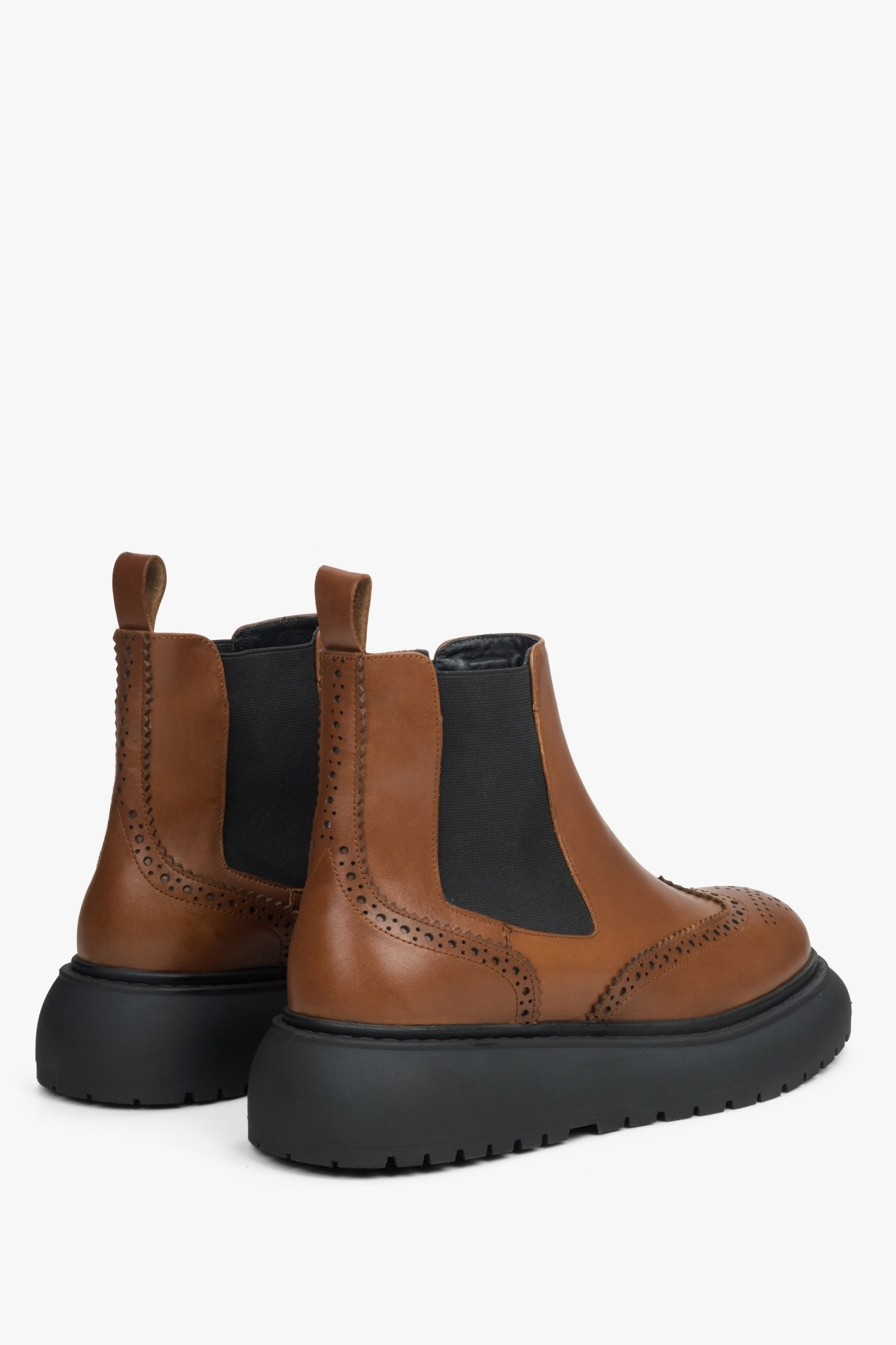 Women's genuine leather chelsea boots in brown - a close-up on shoe profile.