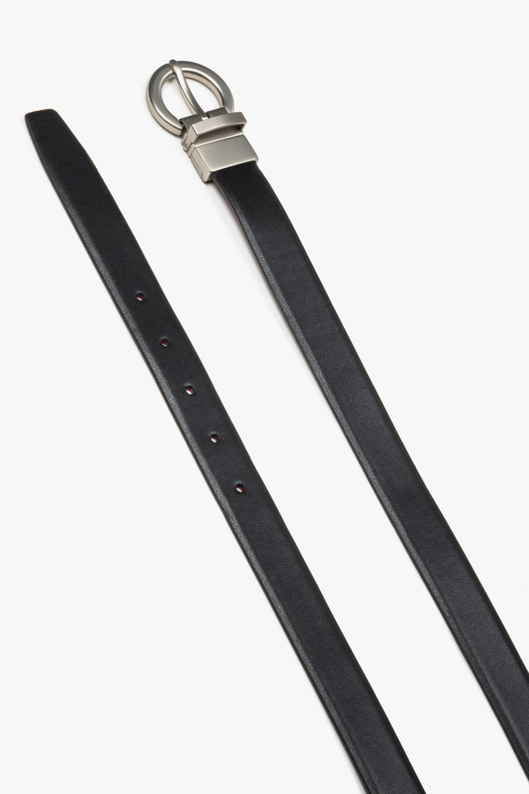 Women's leather belt in black and burgundy with a round silver buckle.
