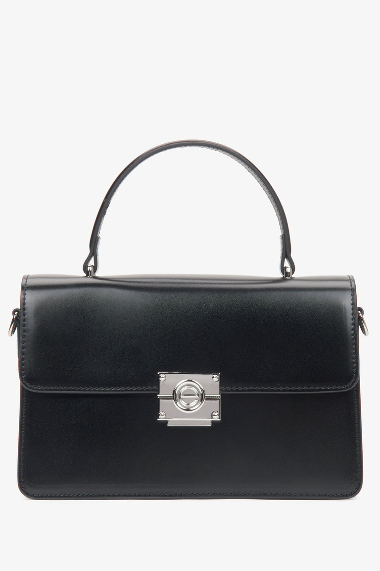 Women's black handbag by Estro featuring sleek silver hardware for a modern and refined look.