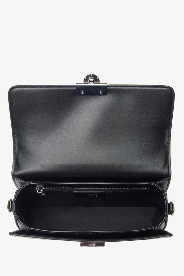 Sleek and functional black handbag for women, enhanced with silver hardware by Estro.