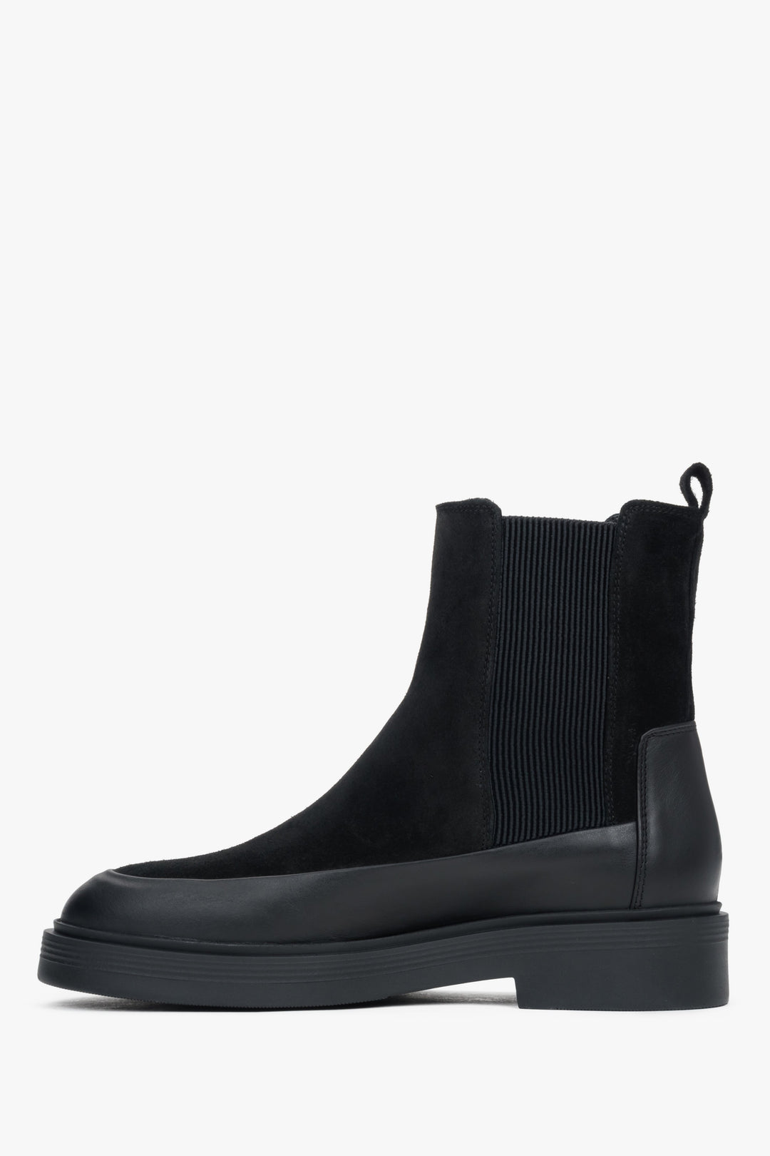 A pair of women's black Chelsea boots crafted from Italian velours and natural leather.