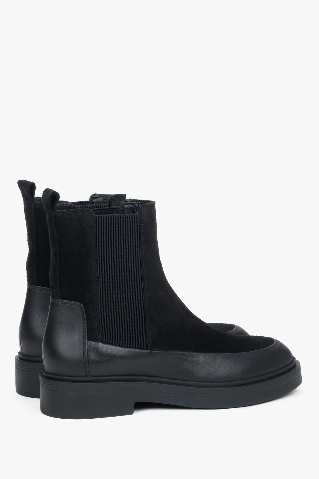 Italian velours and premium natural leather featured on a pair of women's black Chelsea boots.