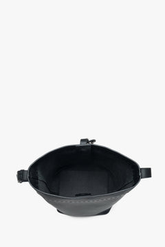 Black bucket bag for women, featuring a genuine leather construction and a strap.