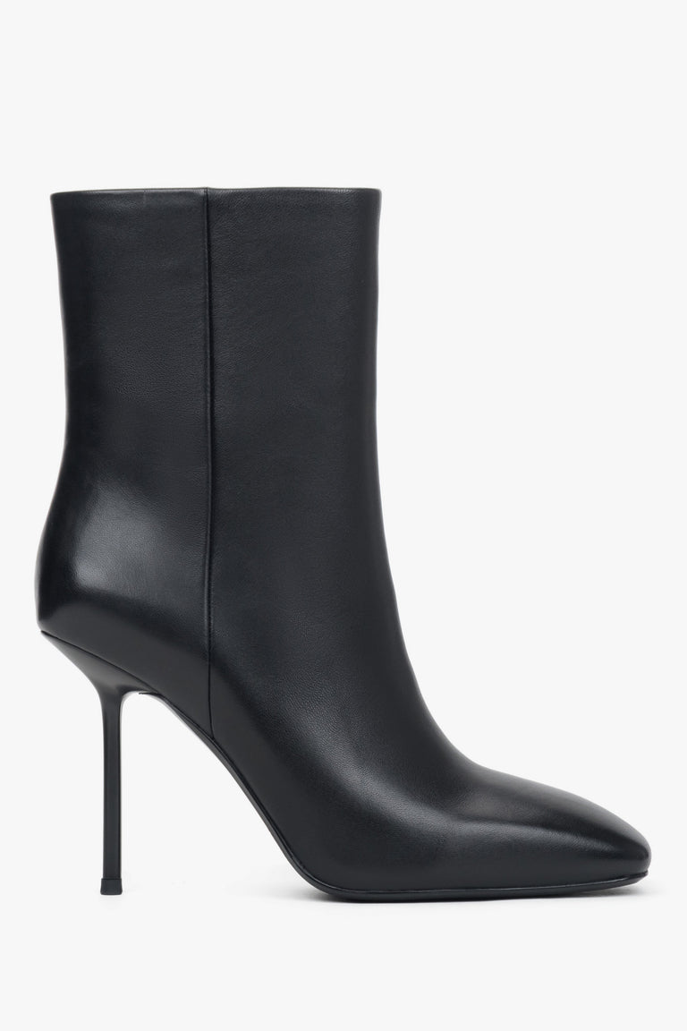 Women's black ankle boots made of genuine leather with a high stiletto heel.