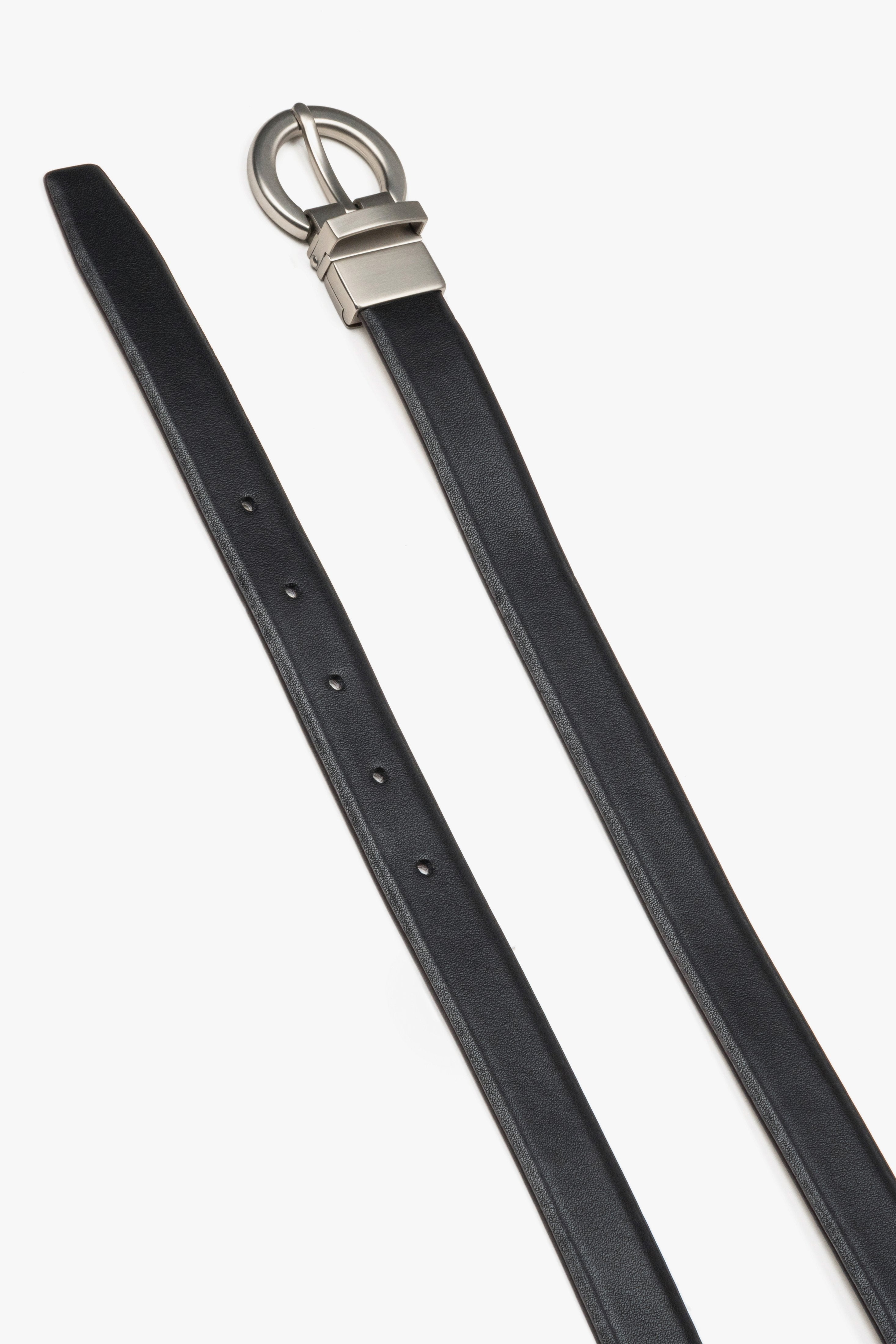 Women's black leather belt by Estro featuring a circular silver buckle.
