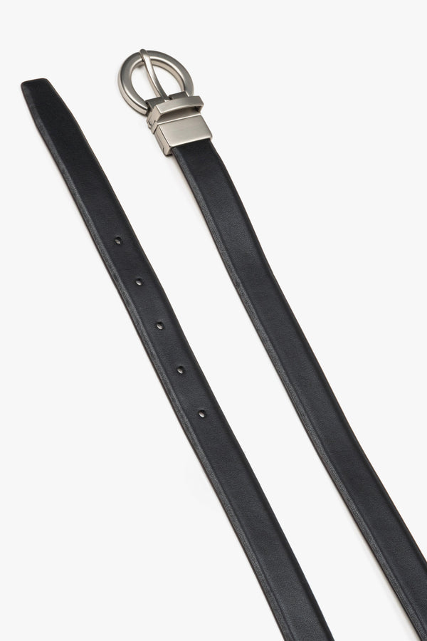 Women's black leather belt by Estro featuring a circular silver buckle.
