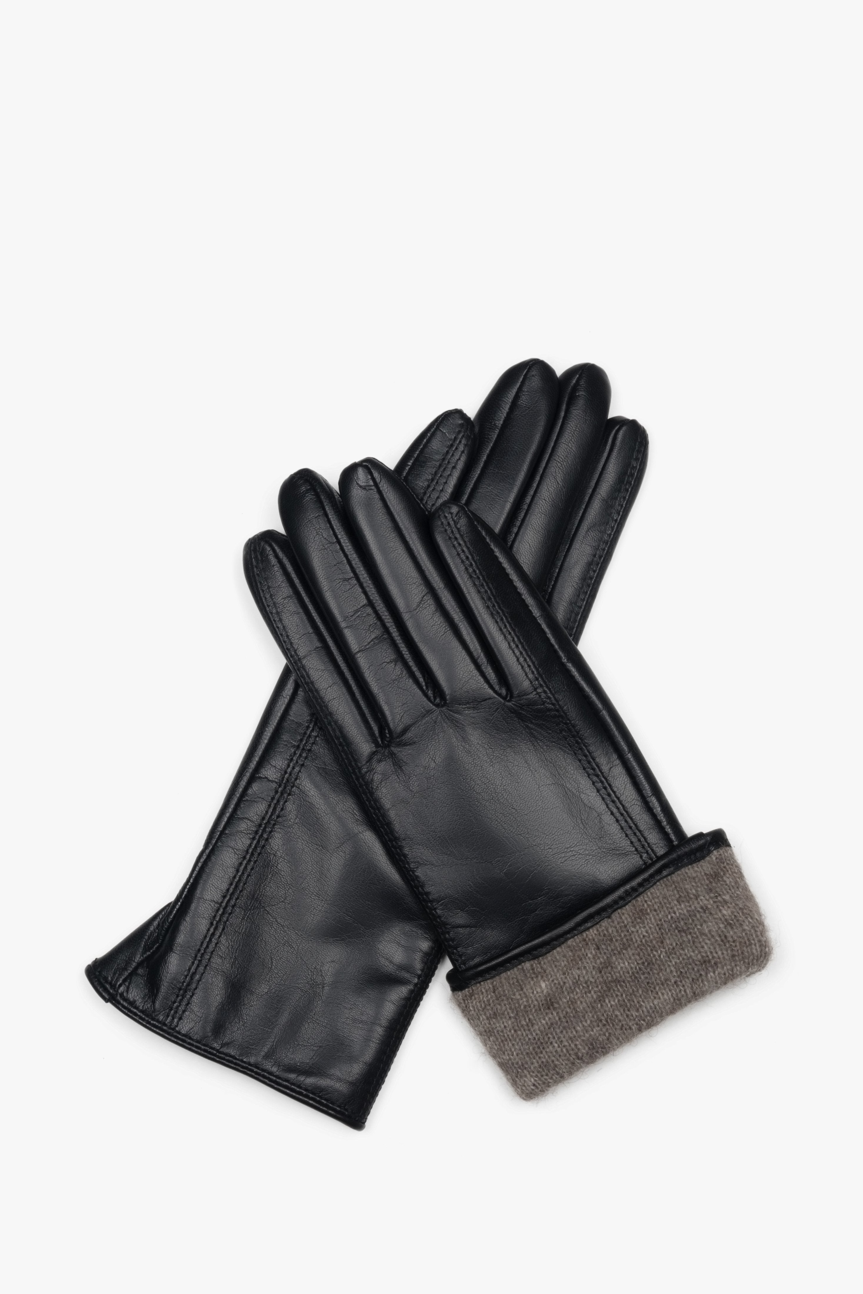 Women's classic black gloves made of genuine leather with a wool lining.
