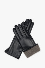 Women's classic black gloves made of genuine leather with a wool lining.
