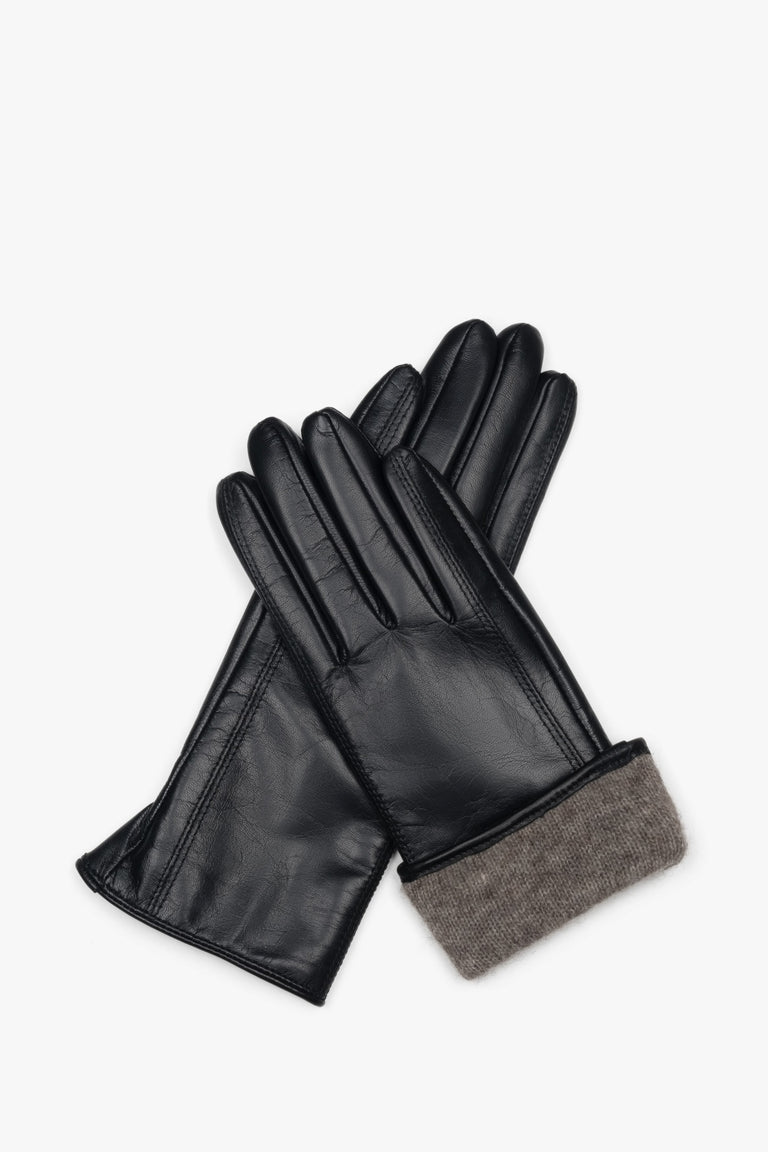 Women's classic black gloves made of genuine leather with a wool lining.
