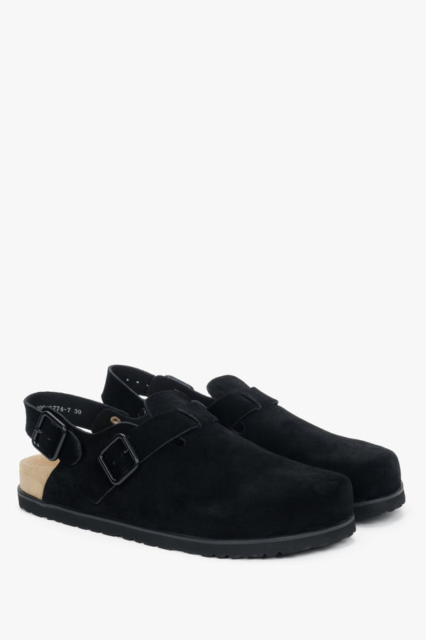 A pair of women's black clogs in genuine suede, featuring a closed-toe design.