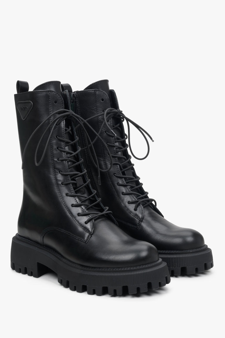 Women's black high leather combat boots by Estro for fall.