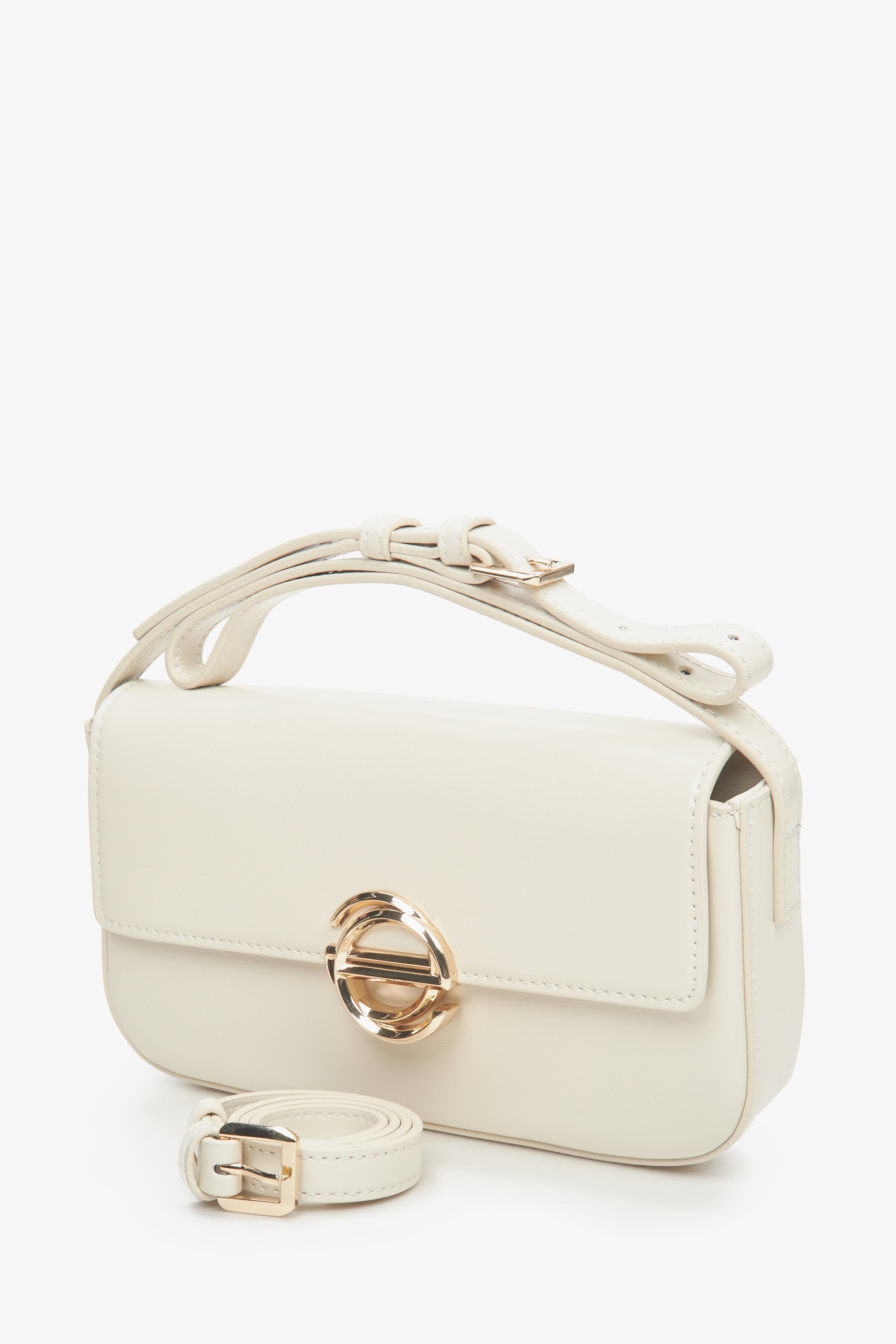 Women's leather light beige shoulder bag with golden hardware by Estro.