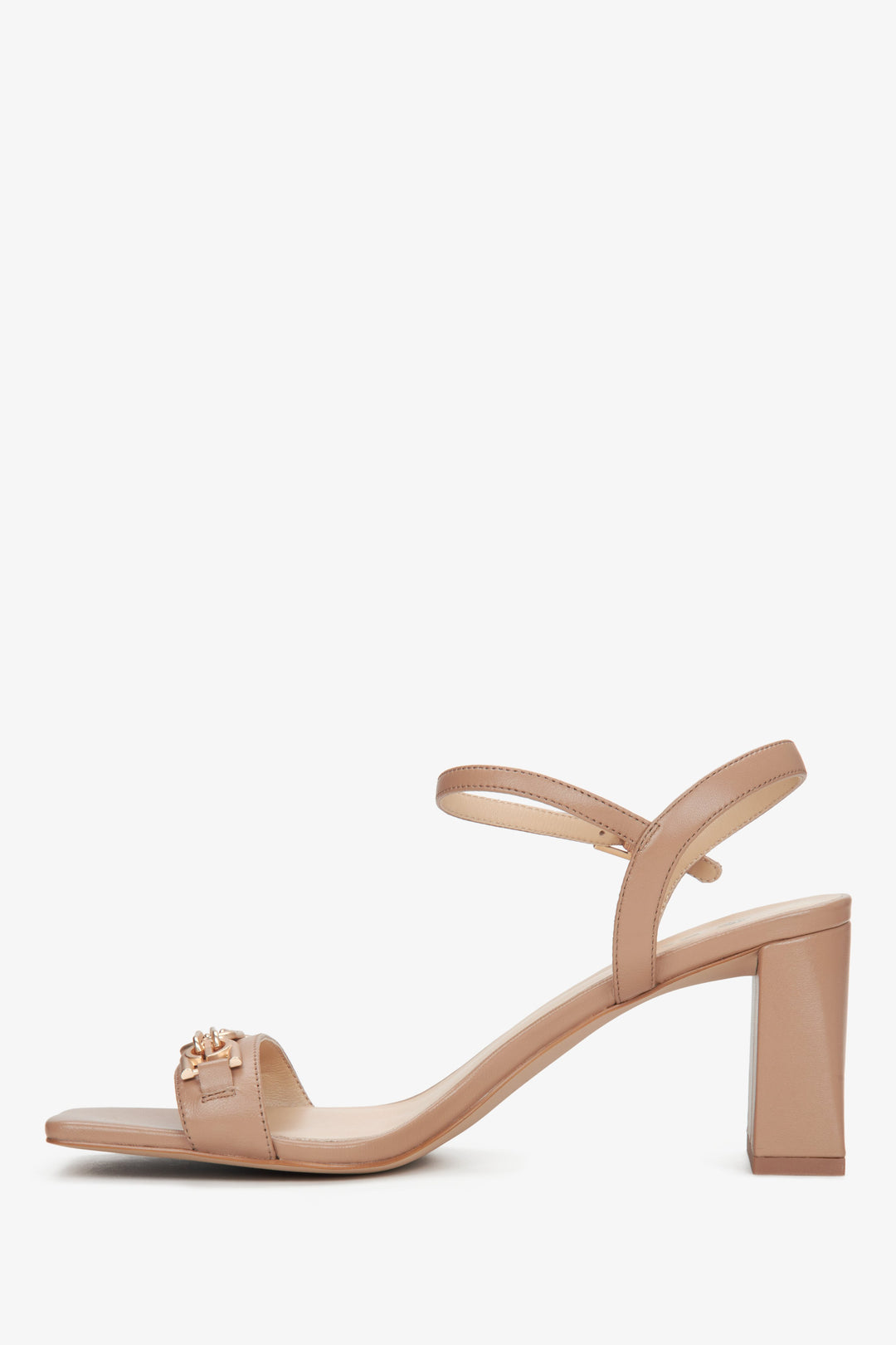 Women's block heel sandals made of genuine leather in a beige colour - shoe profile.