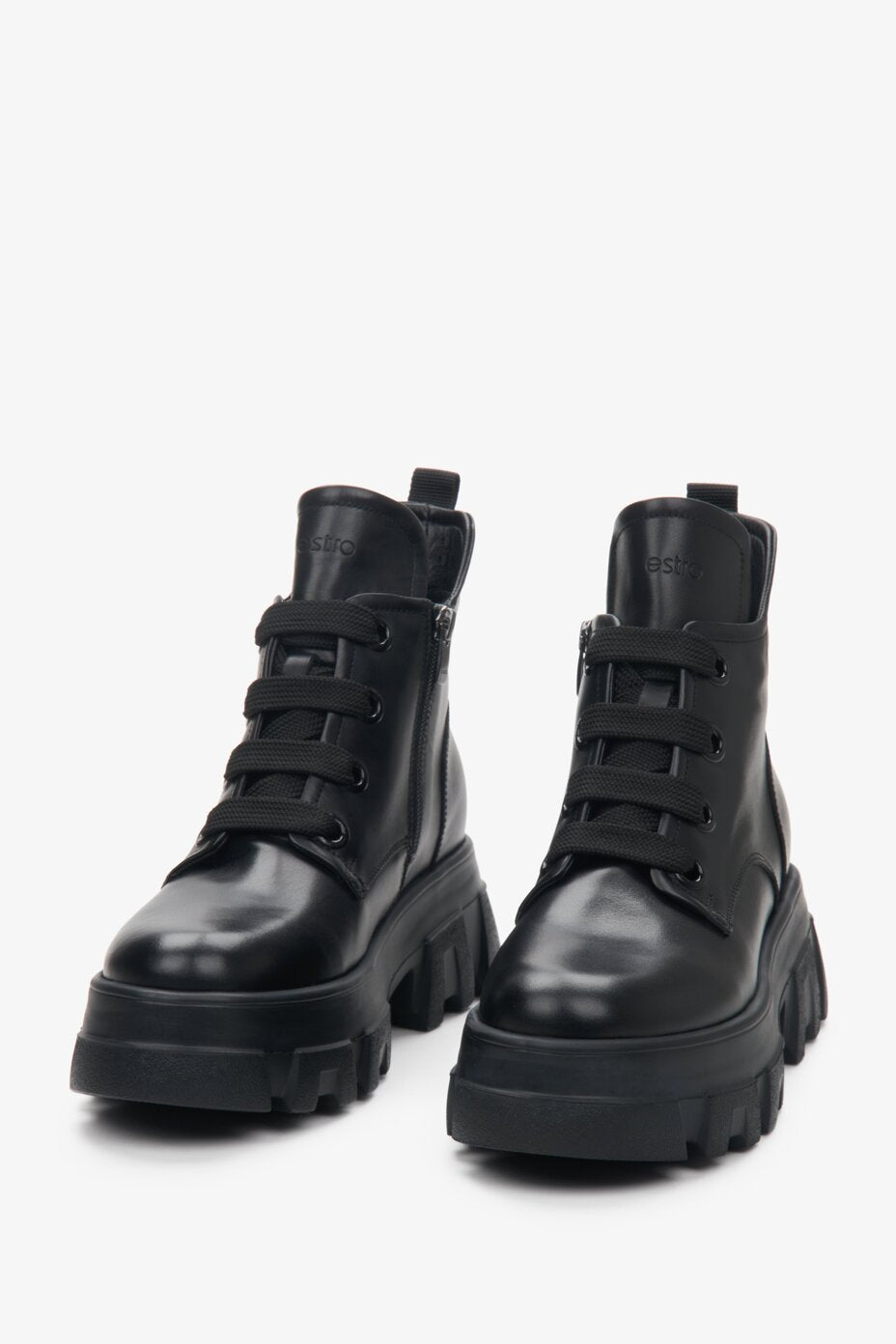 Leather, black Estro women's winter boots with laces - close-up on the toe.