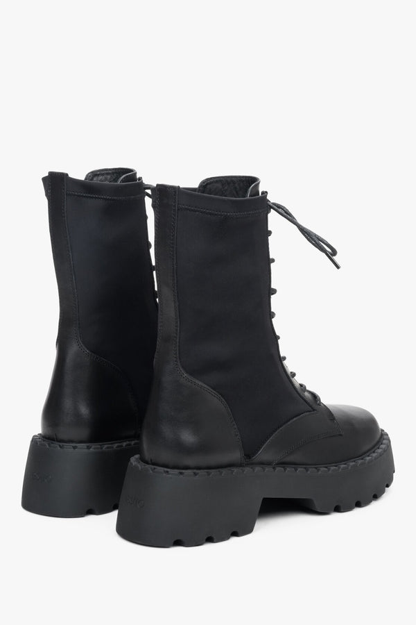 Women's black transitional leather boots with elastic upper by Estro.