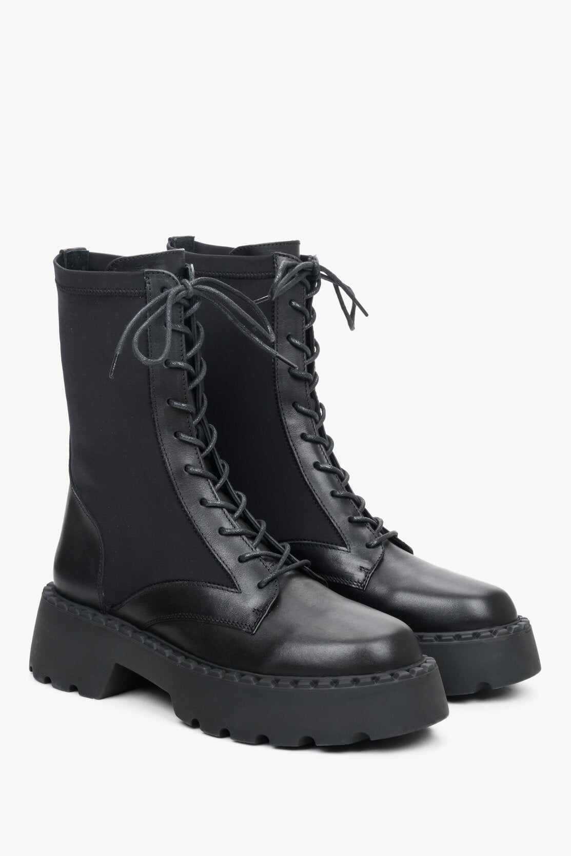 Women's black transitional leather boots with elastic upper by Estro.