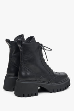 Black leather women's ankle boots Estro - a close-up on shoe toeline.
