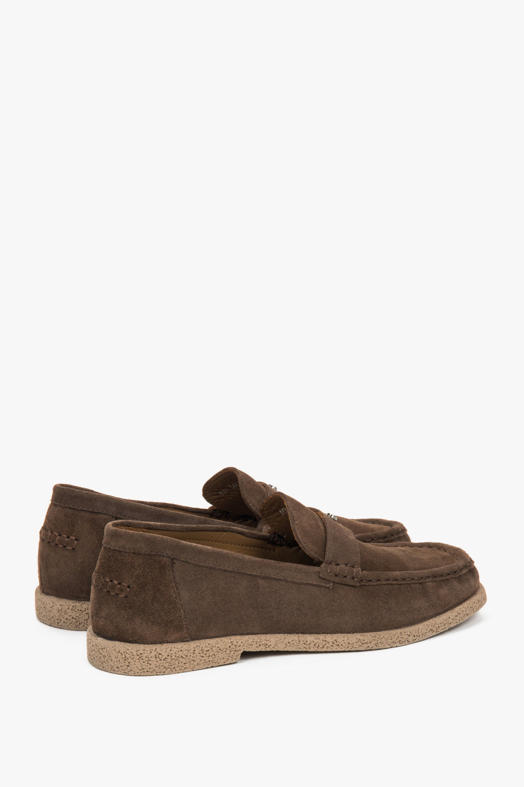 Side profile of a woman's brown loafer, showing the soft, collapsible heel design and the texture of the Italian velour.