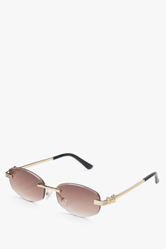 Brown and gold oval rimless sunglasses for women.