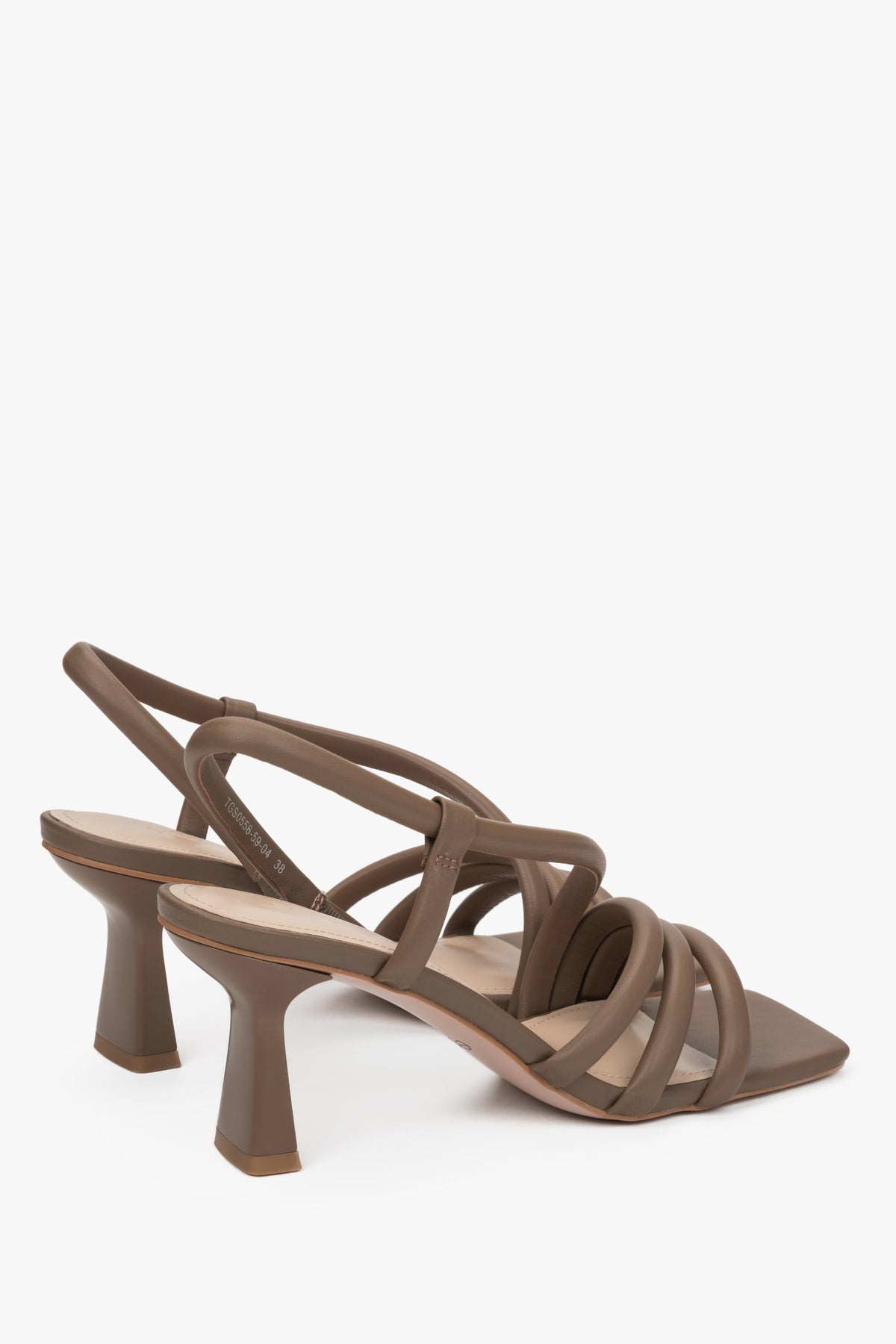 Women's brown strappy sandals made of genuine leather - a close-up on heel and shoe sideline.