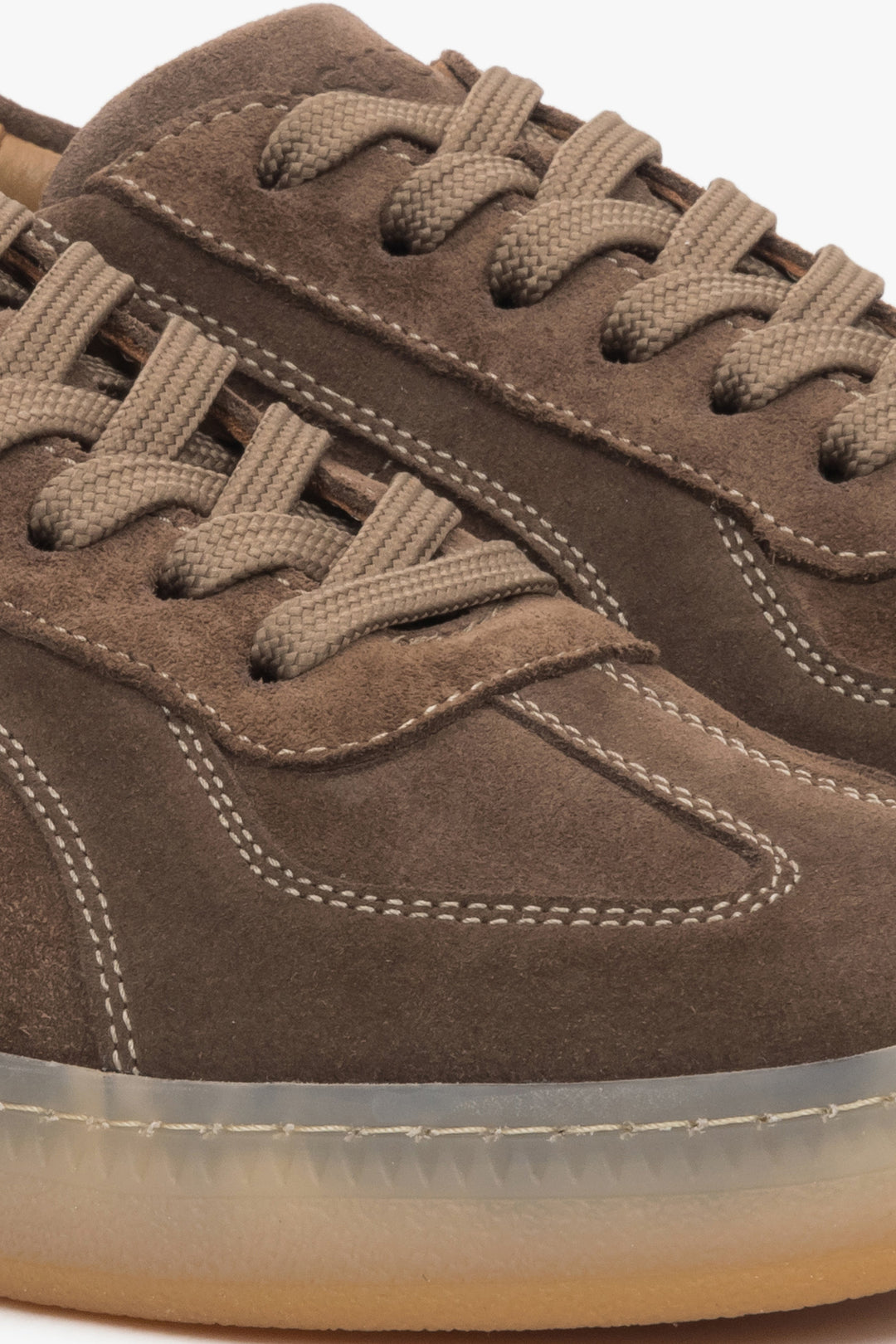 A pair of women's brown sneakers showcasing premium Italian velour.