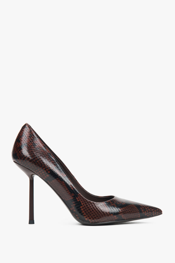 A pair of women's high heels crafted from brown faux snakeskin material.