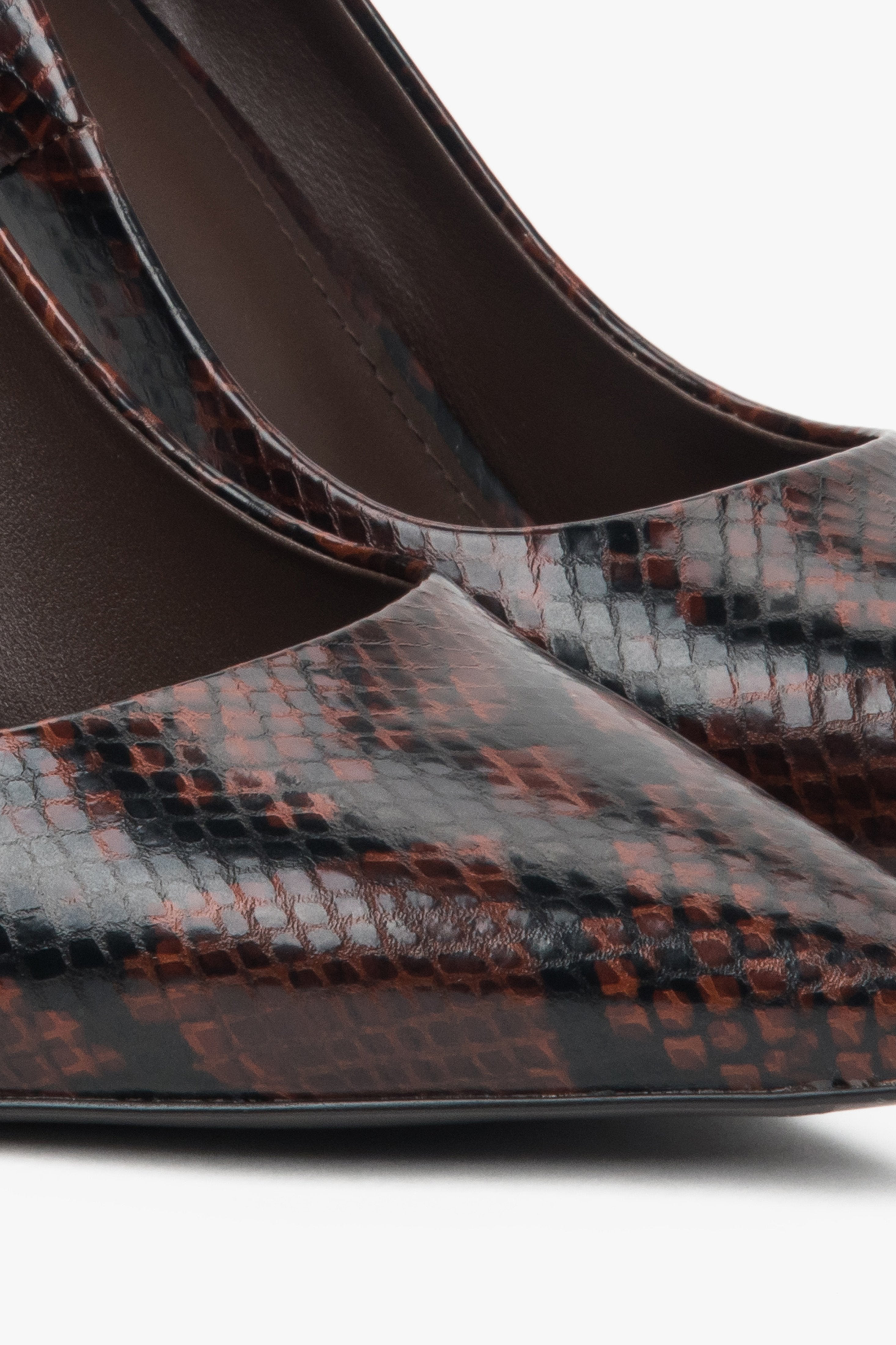 Women's brown high heels with a faux snakeskin pattern - details.
