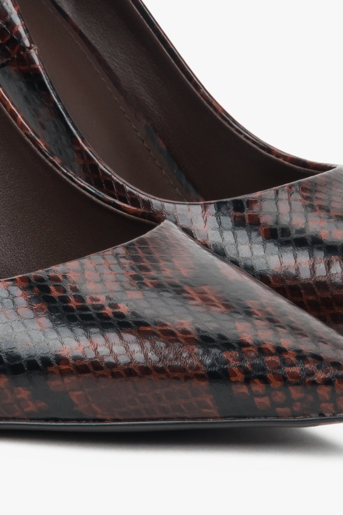 Women's brown high heels with a faux snakeskin pattern - details.