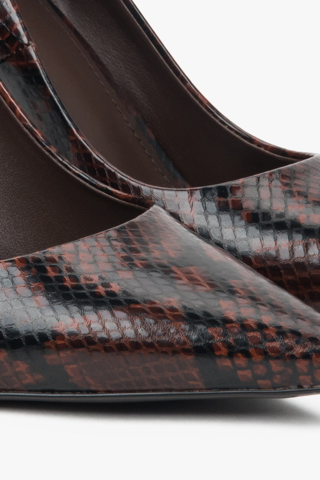 Women's brown high heels with a faux snakeskin pattern - details.