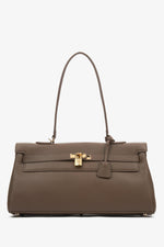 Women's brown shoulder bag by Estro featuring elegant gold-tone hardware for a luxurious finish.