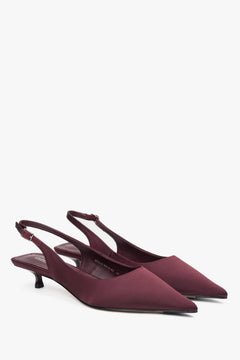 Women’s burgundy slingback pumps with an open heel and low heel by Estro.