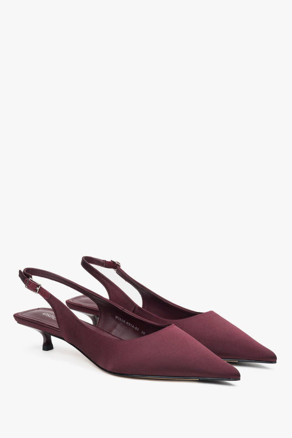 Women’s burgundy slingback pumps with an open heel and low heel by Estro.