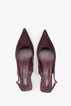 Women’s burgundy slingback pumps with an open heel, low heel, estro – top view.