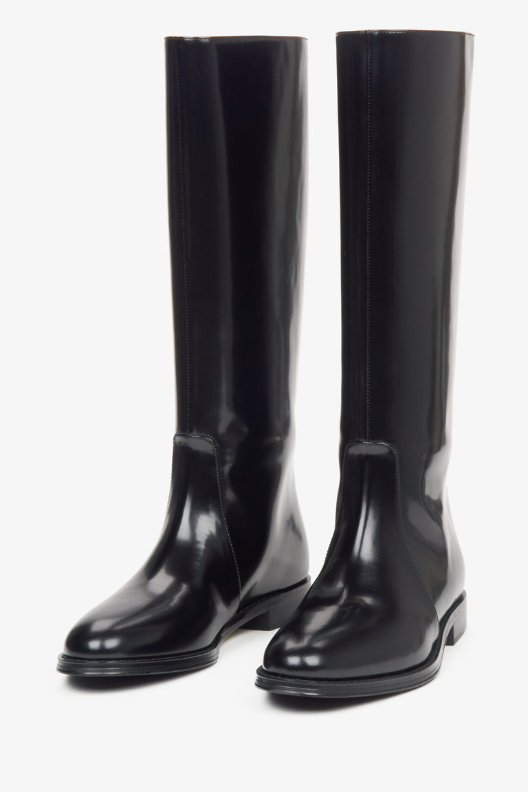 Black leather knee-high boots for women with a wide shaft and high-gloss finish by Estro - front view of the shoes.