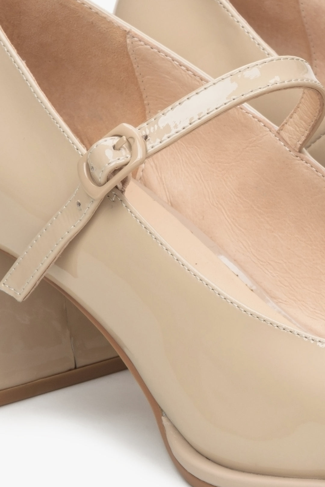 Women's beige leather pumps Mary Jane - a close-up on details.